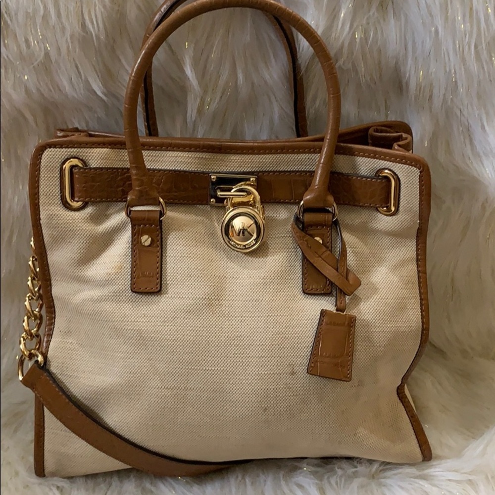 Brown and gold Micheal Kors cloth hand bag